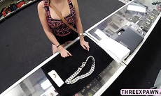 Sexy big tits chick showing what she got in the pawnshop to get the owners dick in her mouth