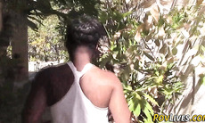 Ebony teen sucks outdoors