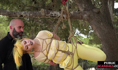 Femsub used in public suspension bondage with spanking