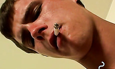 Chainsmoking twink savors mouthfucking with dripping cum