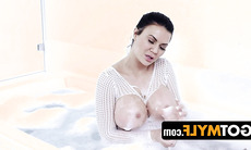 The buxom stepmother, Jasmine Jae, delights in vivid daydreams of making love to her stepson, causing her womanhood to become quite drenched.